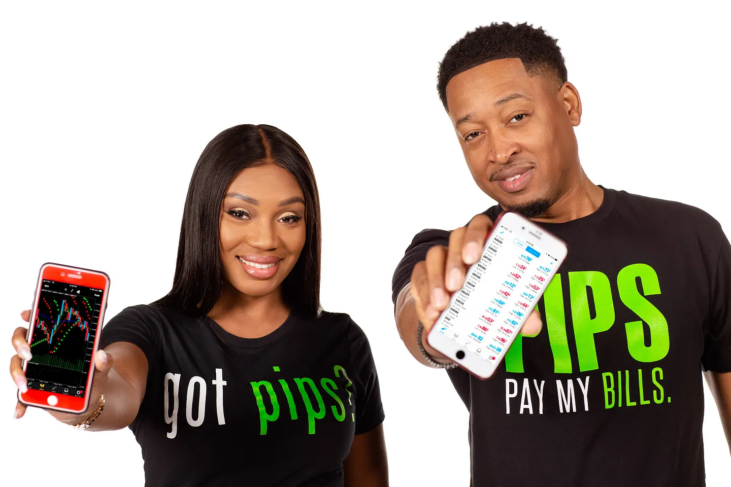 Branding portrait of a couple in matching tees holding up their phones on a white backdrop.